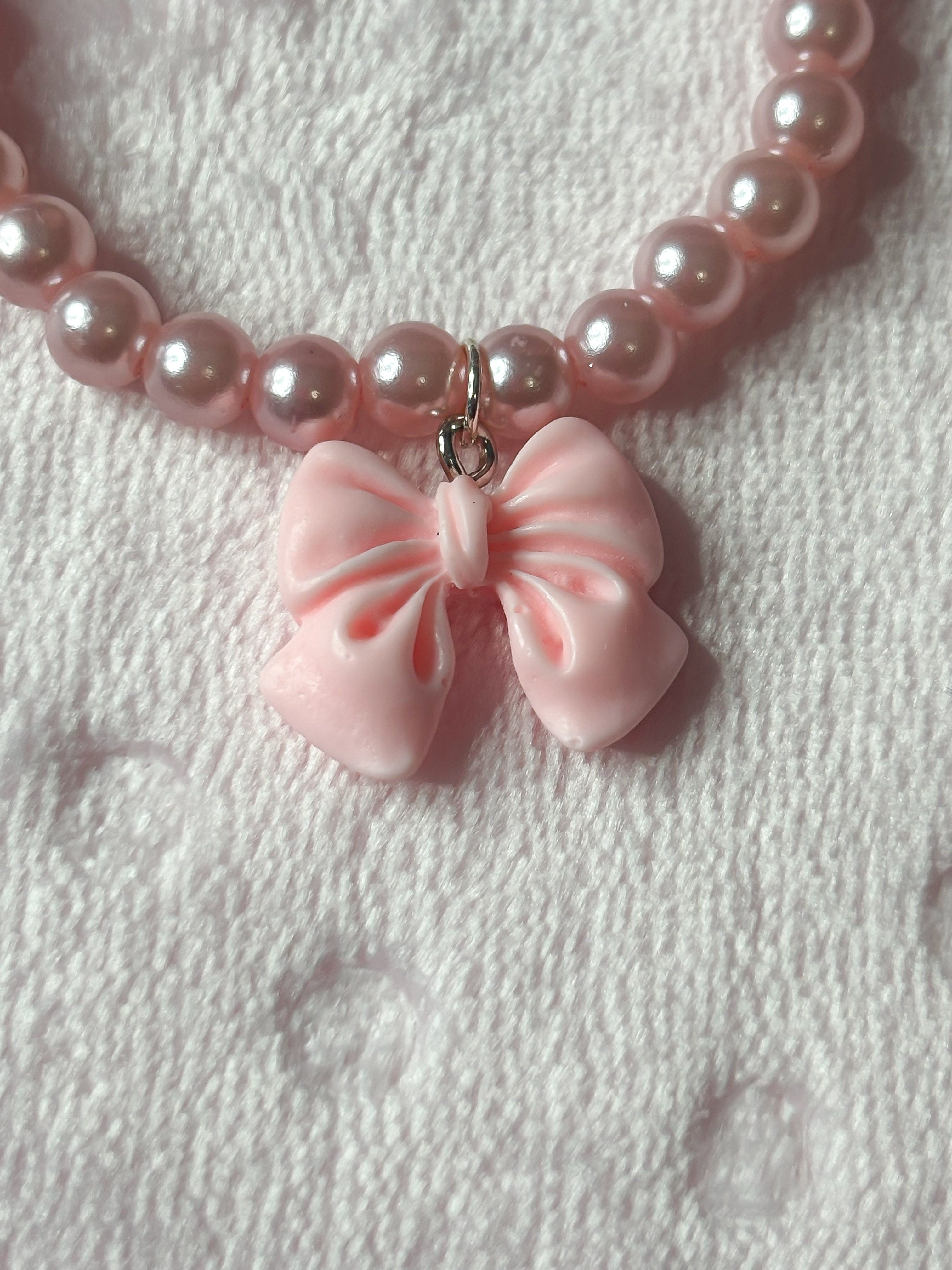 Baby pink pearl bracelet with bow