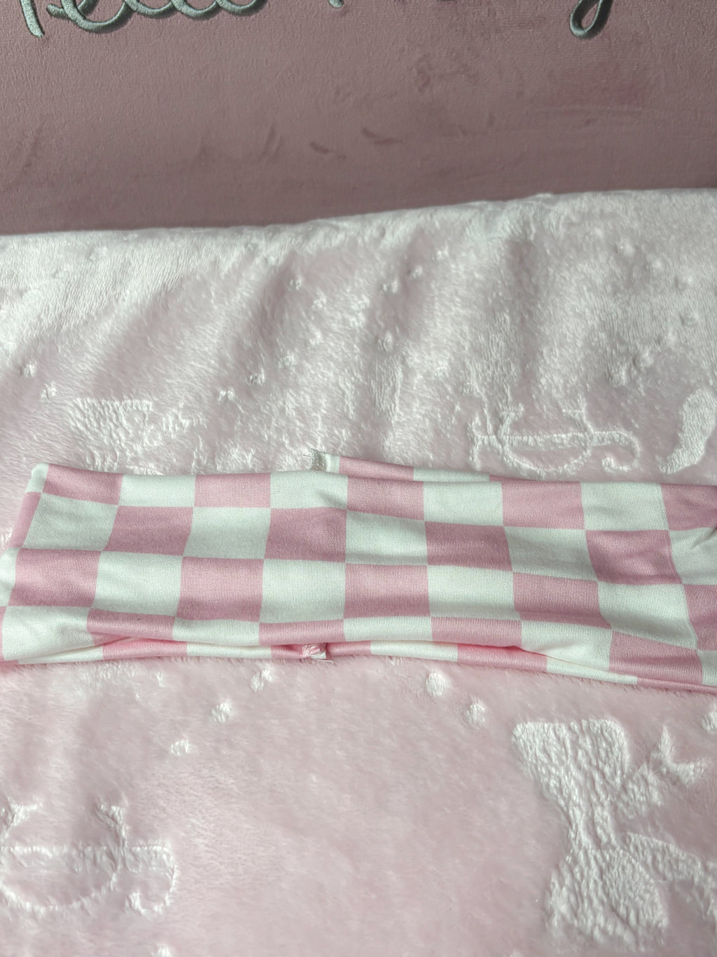Pink and white checker print soft headband