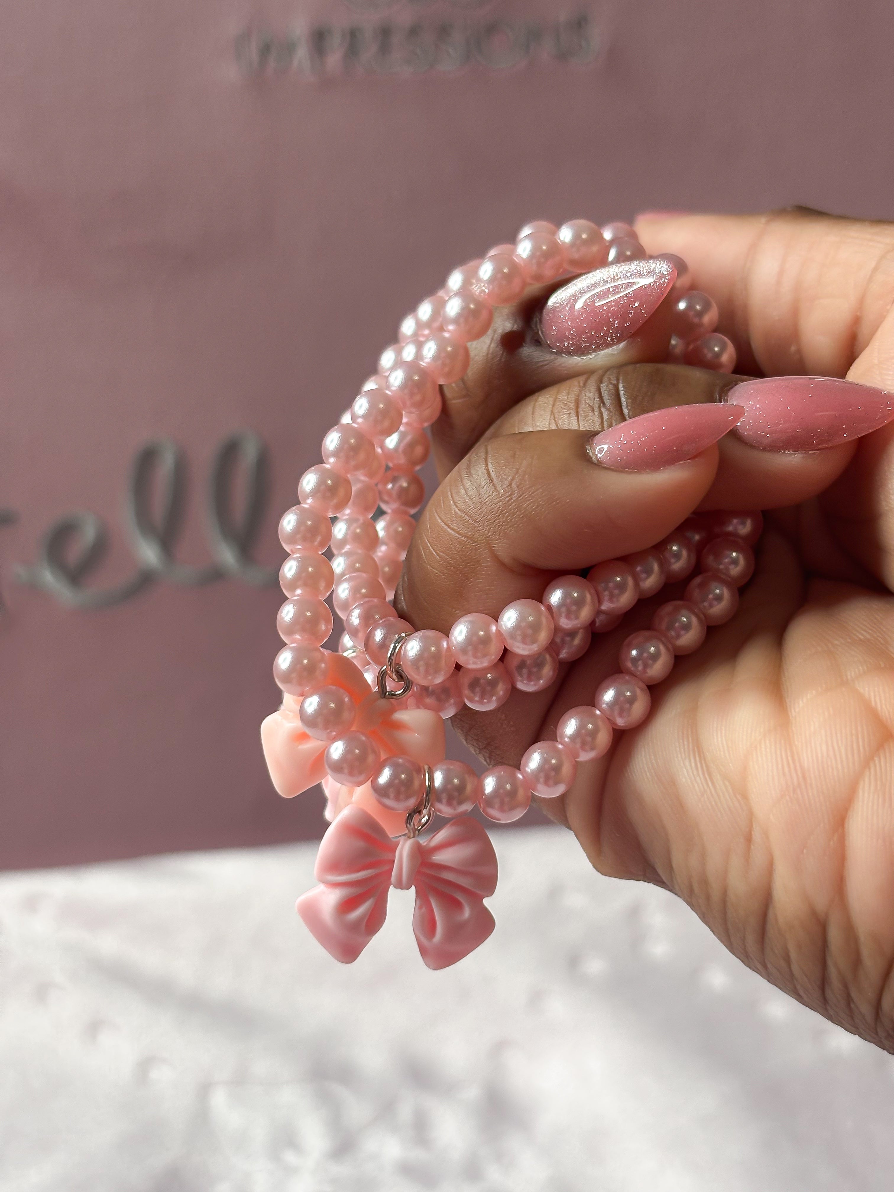Baby pink pearl bracelet with bow