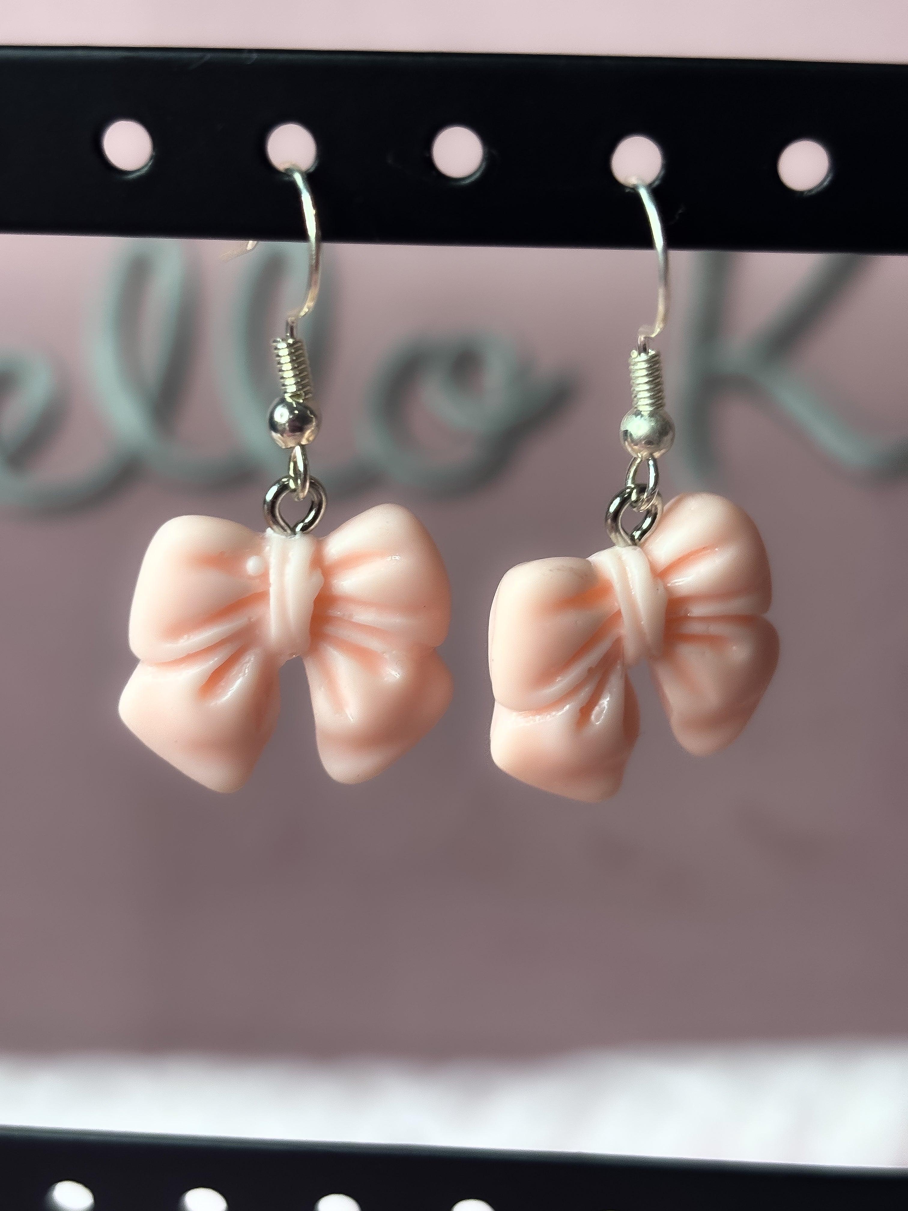Baby pink bow earrings