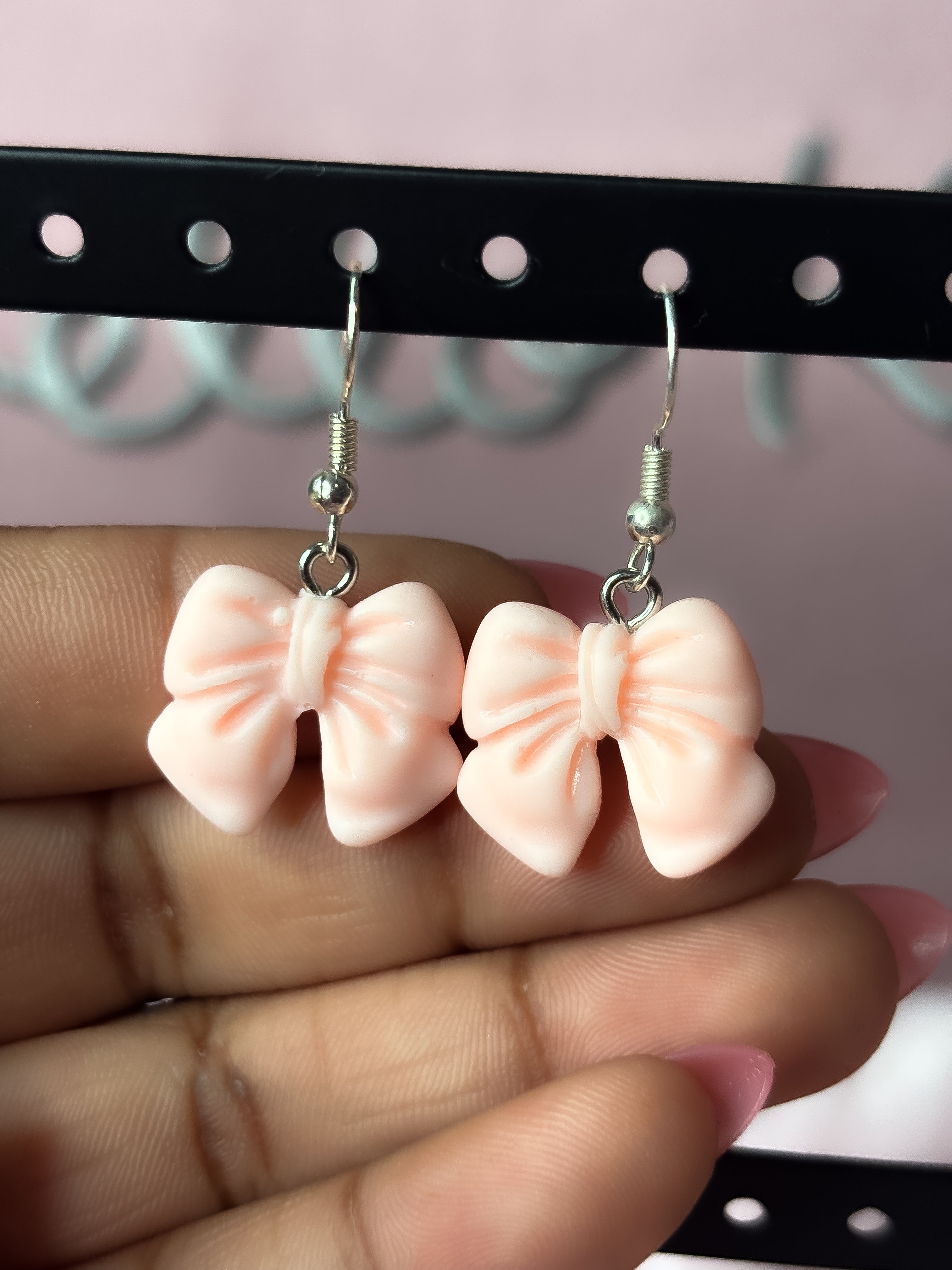 Baby pink bow earrings