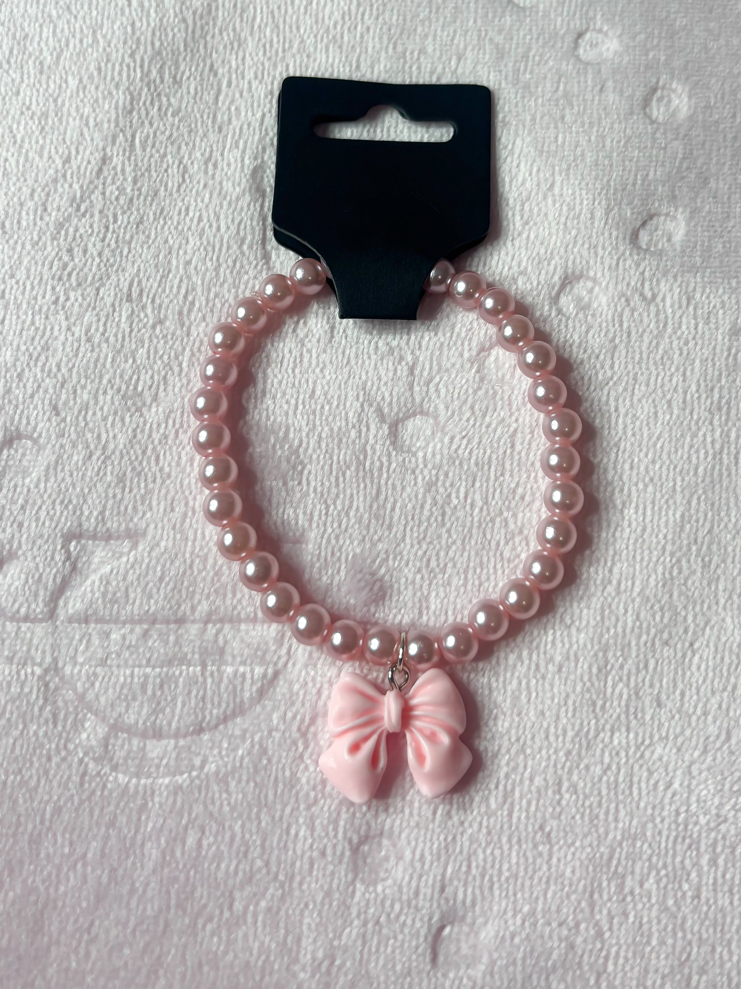 Baby pink pearl bracelet with bow